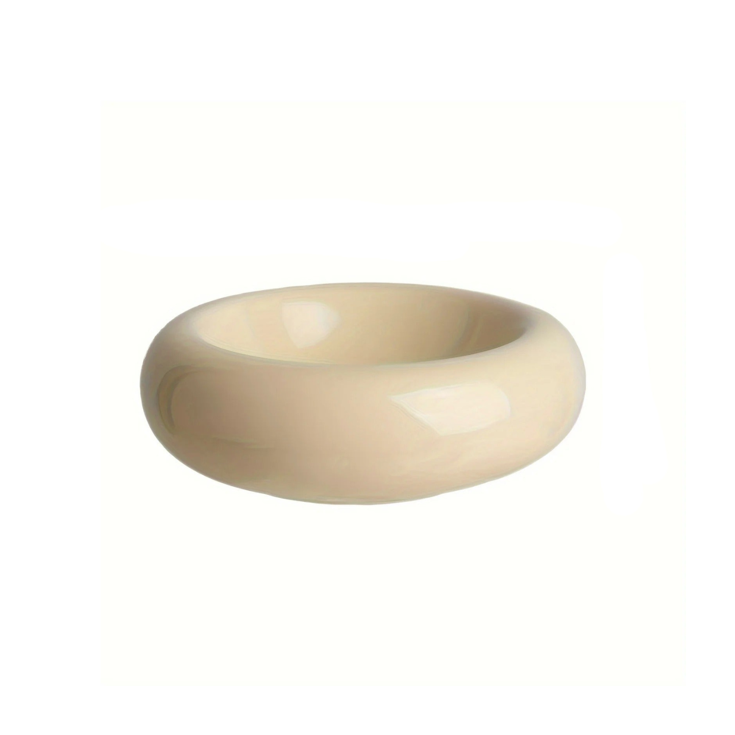 Gamelle en céramique beige élégante pour chien, design arrondi et lisse.