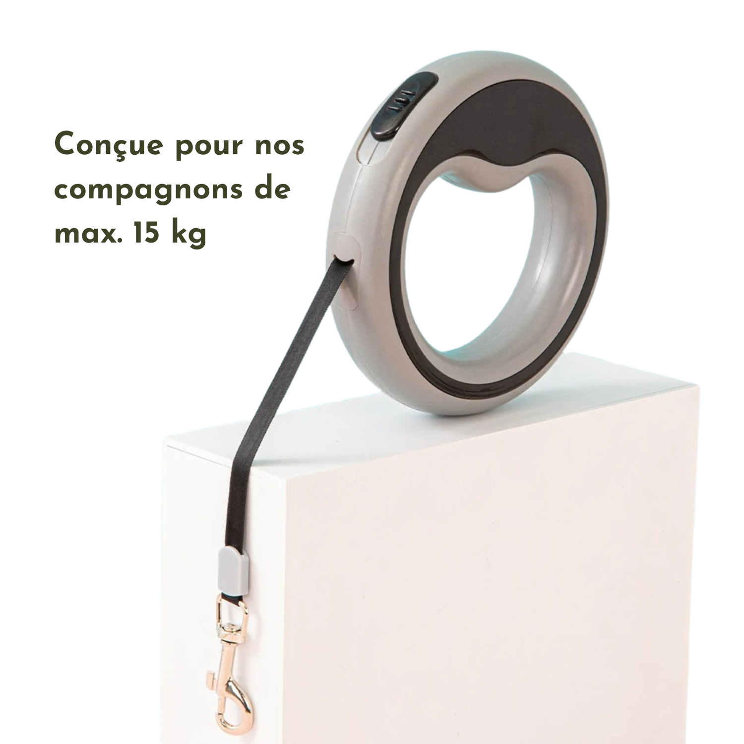 Laisse enrouleur gris avec poignée ergonomique et clip métal pour chien jusqu'à 15 kg.