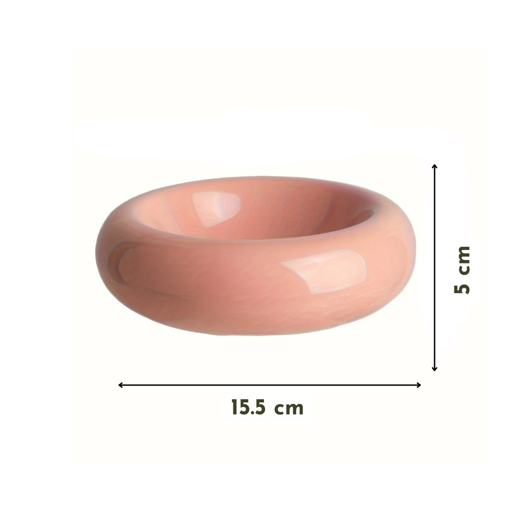 Gamelle en céramique rose pour chien, forme ronde lisse, dimensions 15,5x5 cm.