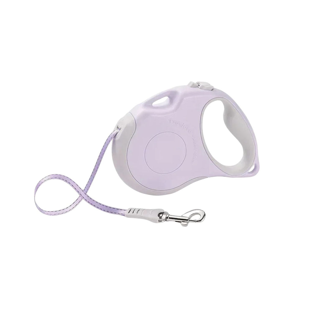 Laisse enrouleur violet clair pour chien avec poignée ergonomique et mousqueton métallique.