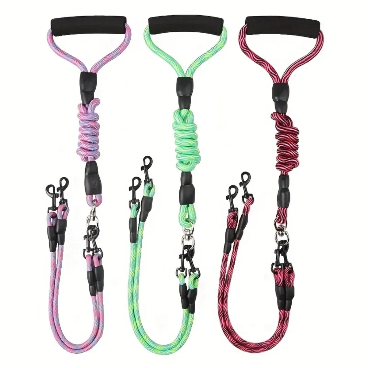 Laisse double pour chien en nylon rose, vert et rouge avec poignées rembourrées et attaches en métal.